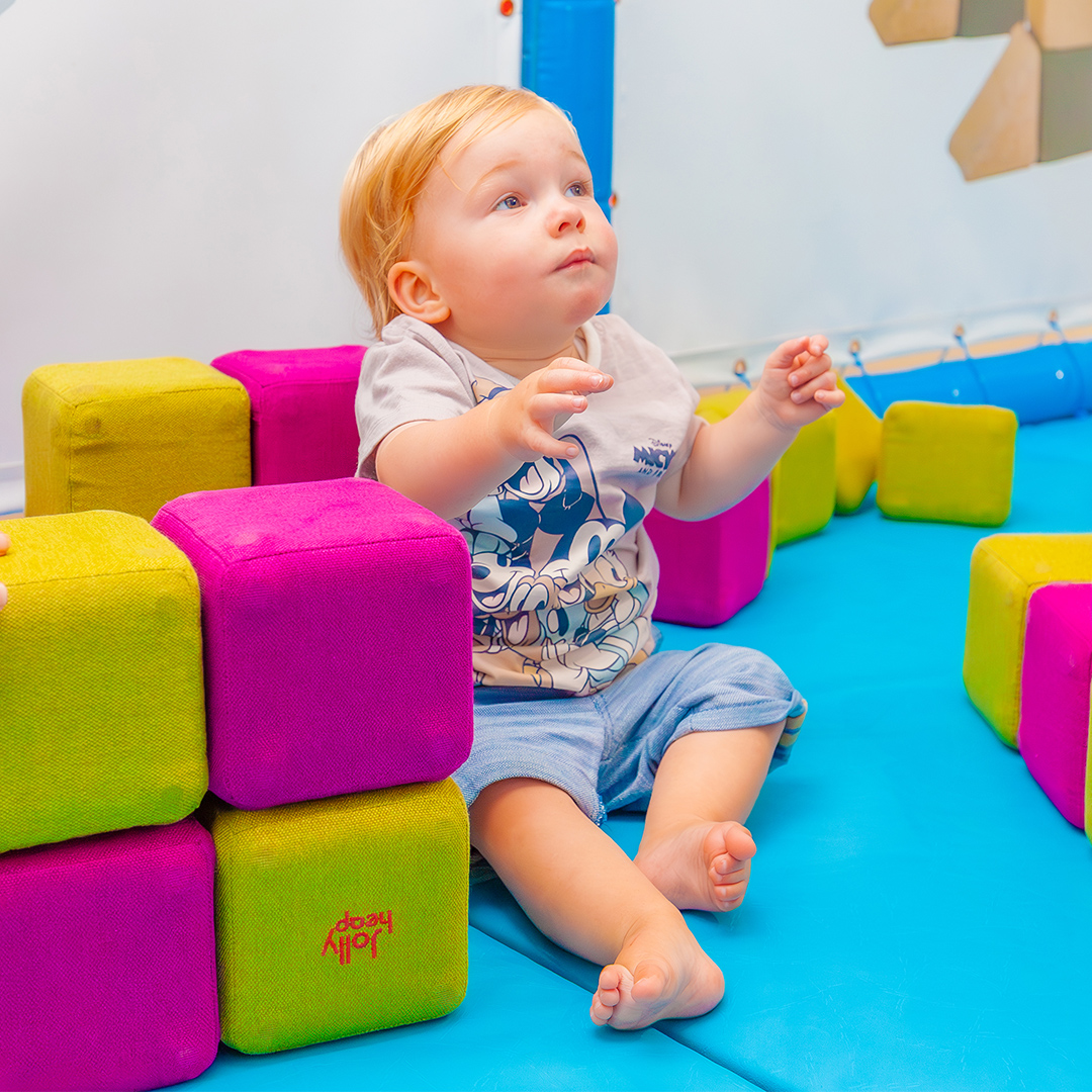 Image of a Toddler enjoying indoor soft play 
